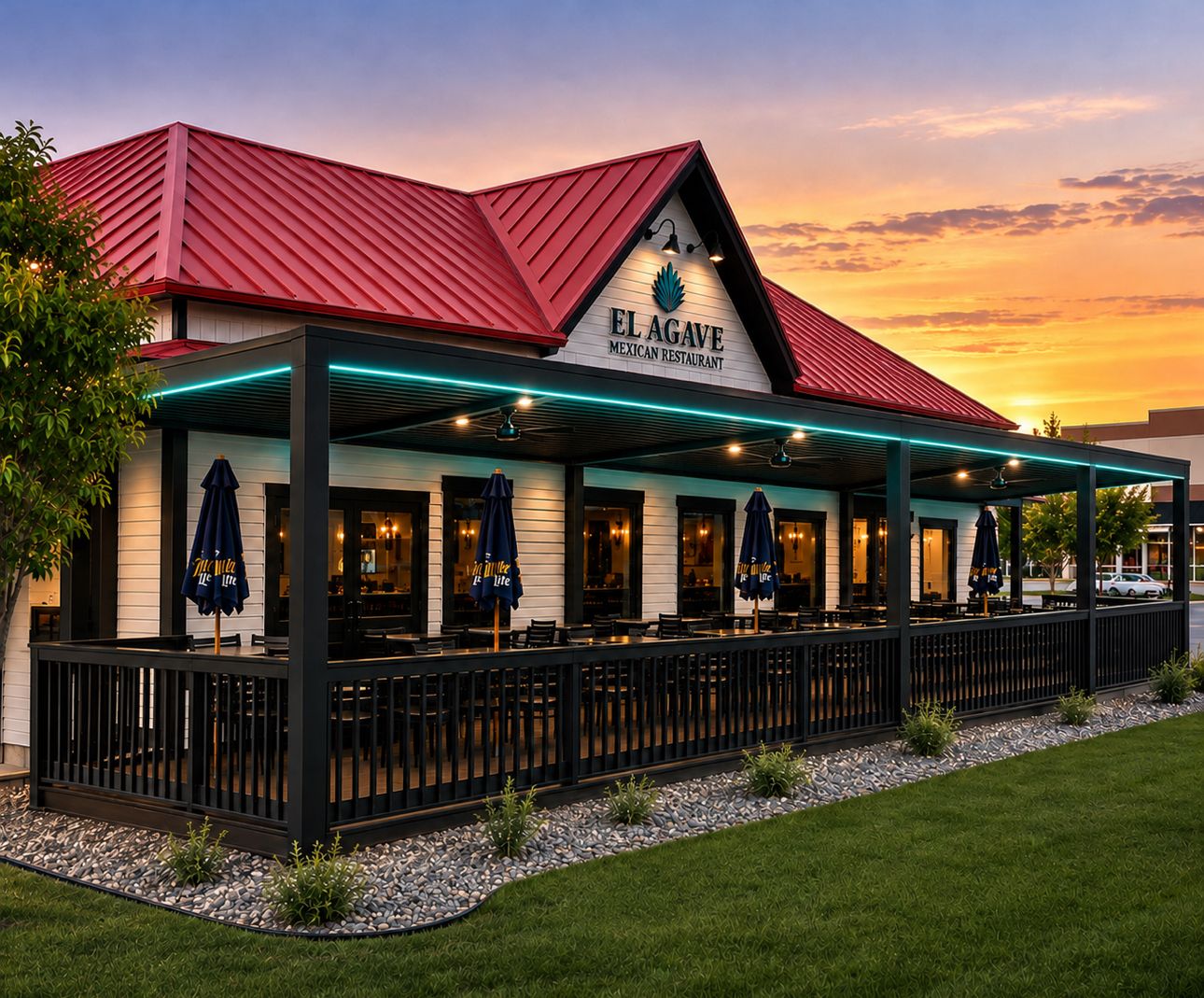 Rooftop bar patio with a louvered pergola lit at dusk