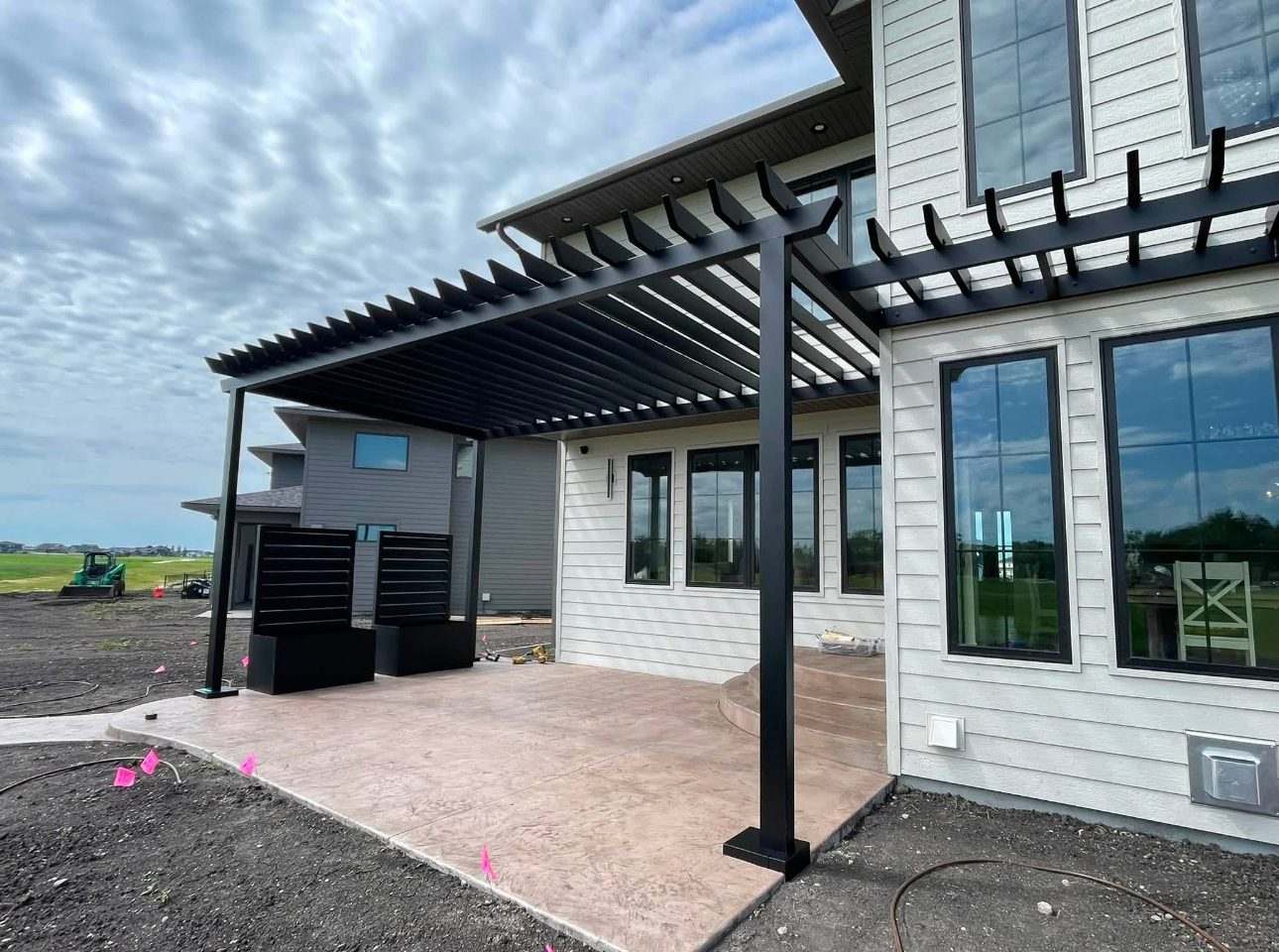 TiDAL-X pergola being installed on a new build in the Fargo area